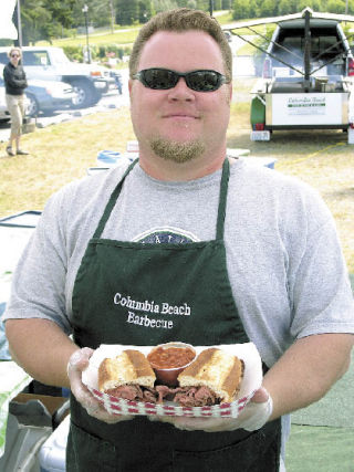 Justin Goodwin of Columbia Beach Barbecue serves up a Santa Maria-style