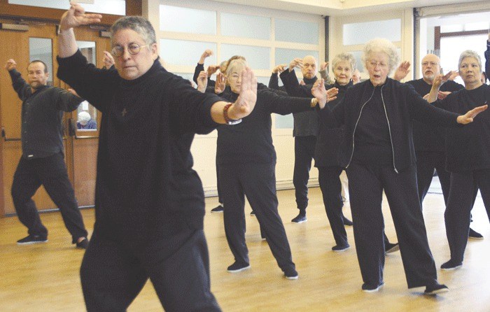 Jill Reed teaches a tai chi class at the Oak Harbor Senior Center Friday. Census results confirm that the populations of Oak Harbor and Island County are growing older and community leaders are looking for ways to help senior citizens keep active and engaged.
