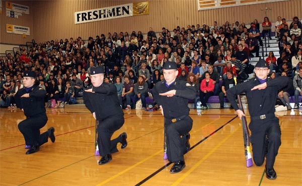 The members of Oak Harbor High School’s Junior Reserve Officer Training Corps (JROTC) unarmed drill team go through their maneuvers during a Veterans Day assembly.