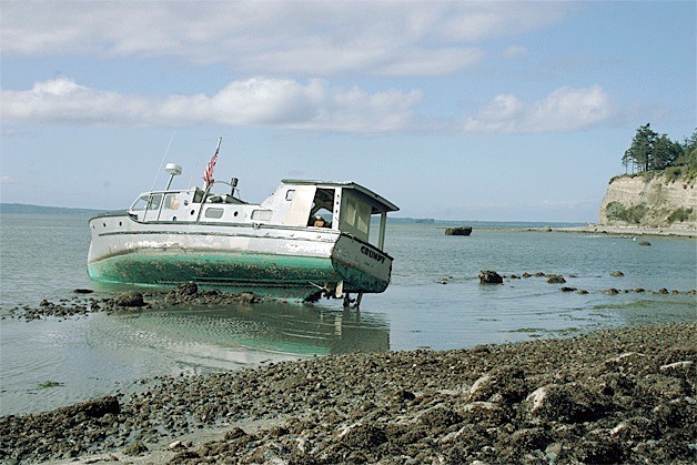 Residents  of the Double Bluff neighborhood were relieved when an abandoned vessel named “Grumpy” was towed away.