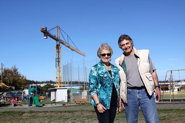 Sue Karahalios and Richard Nash stand at the site of where a sculpture is being planned that honors Oak Harbor's three founders. The artwork would rest near the waterfront at Windjammer Park just east of City Beach Street. A community-driven fundraising effort is underway.