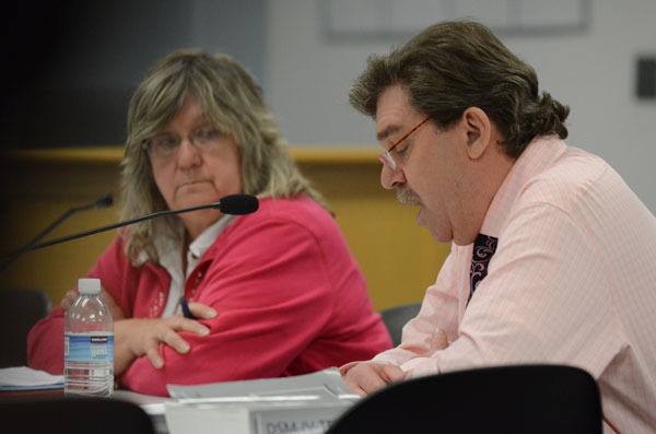 Island County Human Services Director Jackie Henderson listens as Island County Recovery Services Manager Mark MacNaughton addresses the Board of Commissioners Wednesday.