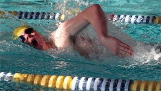 Tyler Schell swim to victory in the 200 freestyle. The Oak Harbor sophomore has qualified for the Class 4A state meet in the 100