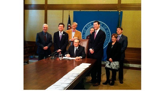 Governor Jay Inslee signs the Attorney General request open government legislation.