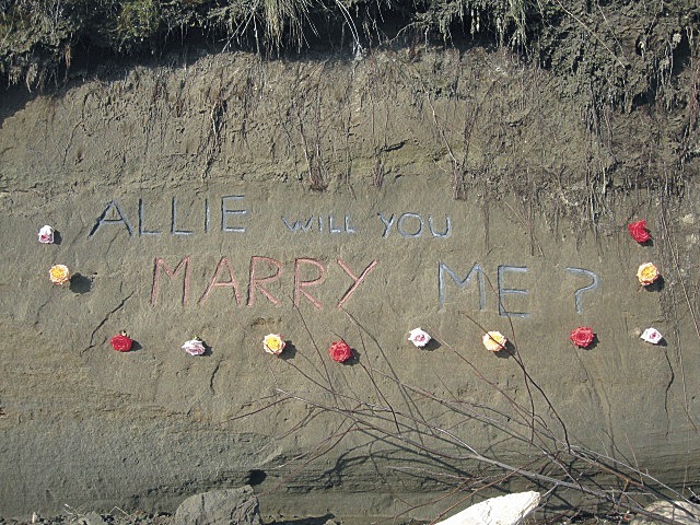 The author of this marriage proposal along a bluff near Mariners Cove remains a mystery.