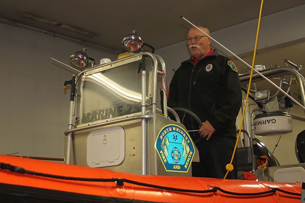 Jim O’Connor stands in the Marine Search and Rescue team’s boat
