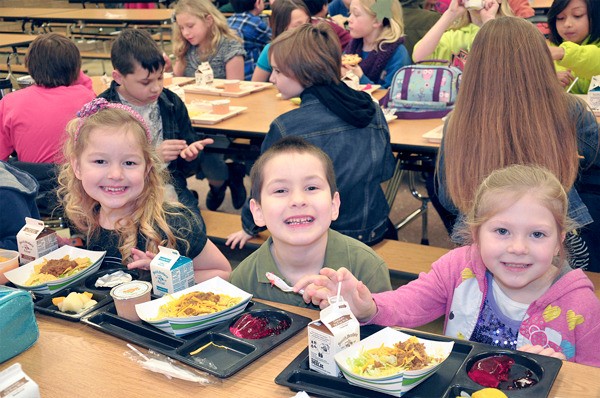 Broadview Elementary students enjoy a hot taco lunch at the school cafeteria.