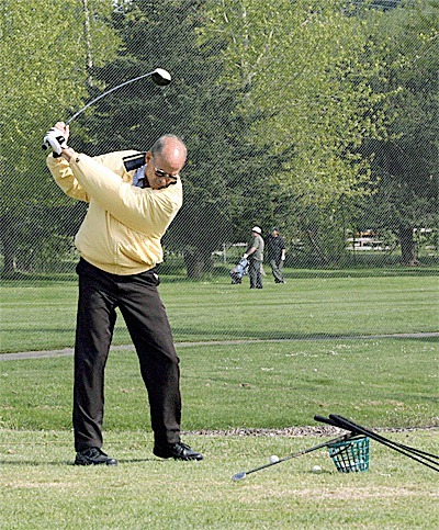 Gary Crabtree practices his swing at the Navy’s Gallery Golf Course on North Whidbey. He said it’s a great golf course and he uses it every chance he gets. He feels it’s environmentally smart to use local water instead of piping it in from a river.