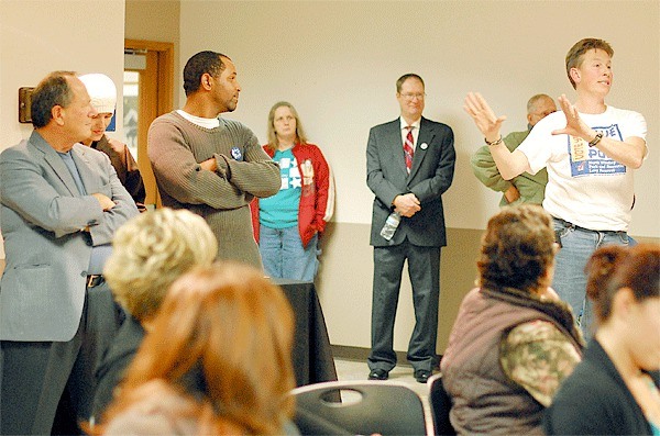 Oak Harbor resident Steve Hoffmire (far right) appeals to the moderator for intervention during a political forum at Skagit Valley College last week. Hoffmire alleged that Christon Skinner and Gerry Oliver (far left) were being disrespectful while mayoral hopeful Scott Dudley was speaking.