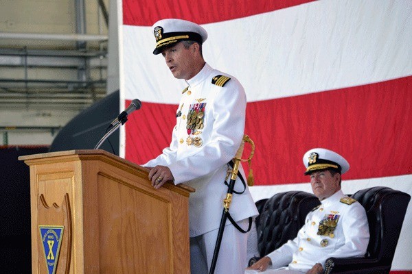 Capt. Peter Garvin speaks to those gathered for his Change of Command ceremony Friday