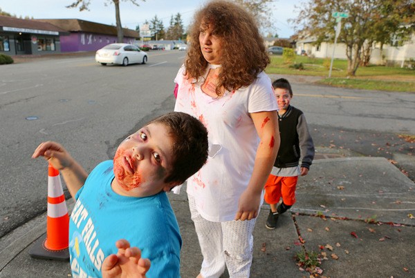 An Oak Harbor boy was one of many “zombies” that swaggered down Midway Boulevard Saturday as part of the city’s annual Monster Mash and Zombie Crawl.