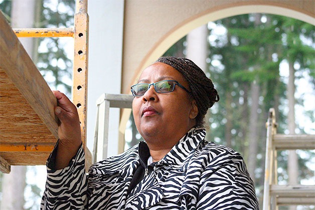 Pastor Fannie Dean of Mission Ministry Outreach stands outside of her congregation’s unfinished church on Goldie Road. The group is hoping to raise the final $80
