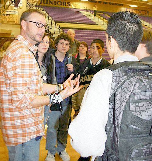 National speaker Stu Cabe speaks to Oak Harbor High School students after his anti-bullying presentation.