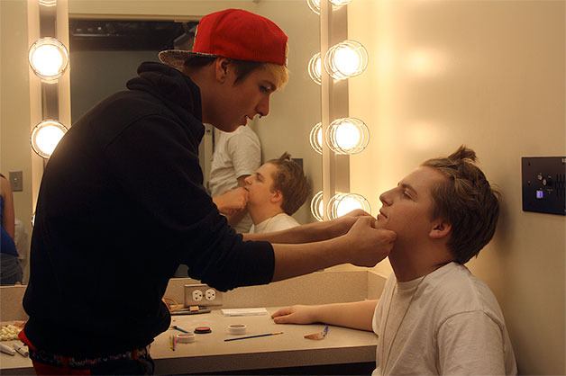 Johnny Hodges does Caleb Allen’s makeup before the Feb. 19 performance of ‘All My Sons’ at Oak Harbor High School.