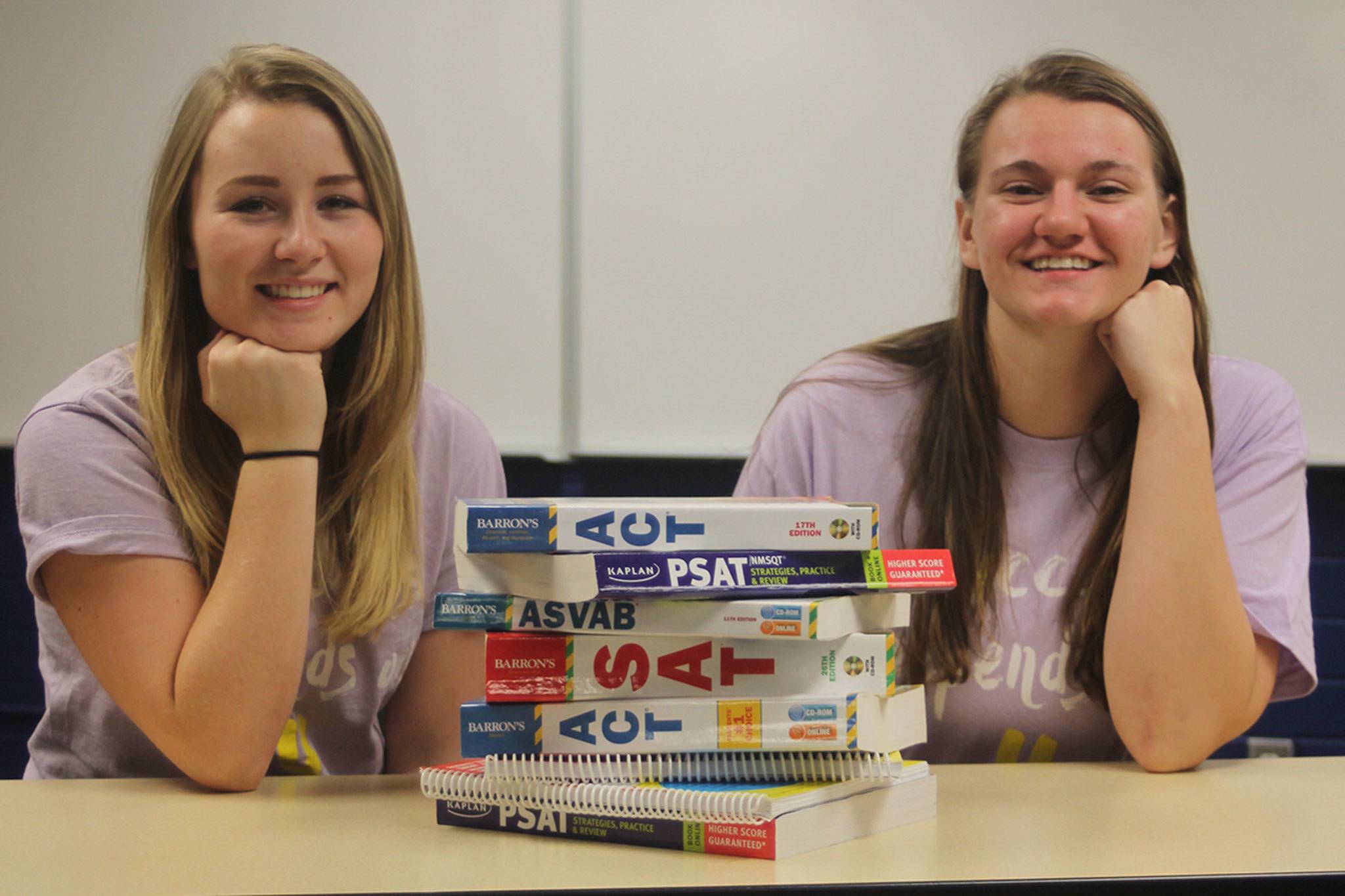 Photo by Jim Waller/Whidbey News-Times                                The Oak Harbor High School volleyball team ranks second among 3A schools in the state for grade point average. Wildcat seniors Lauren May, left, and Julie Jansen are two of the three team members with perfect GPAs.
