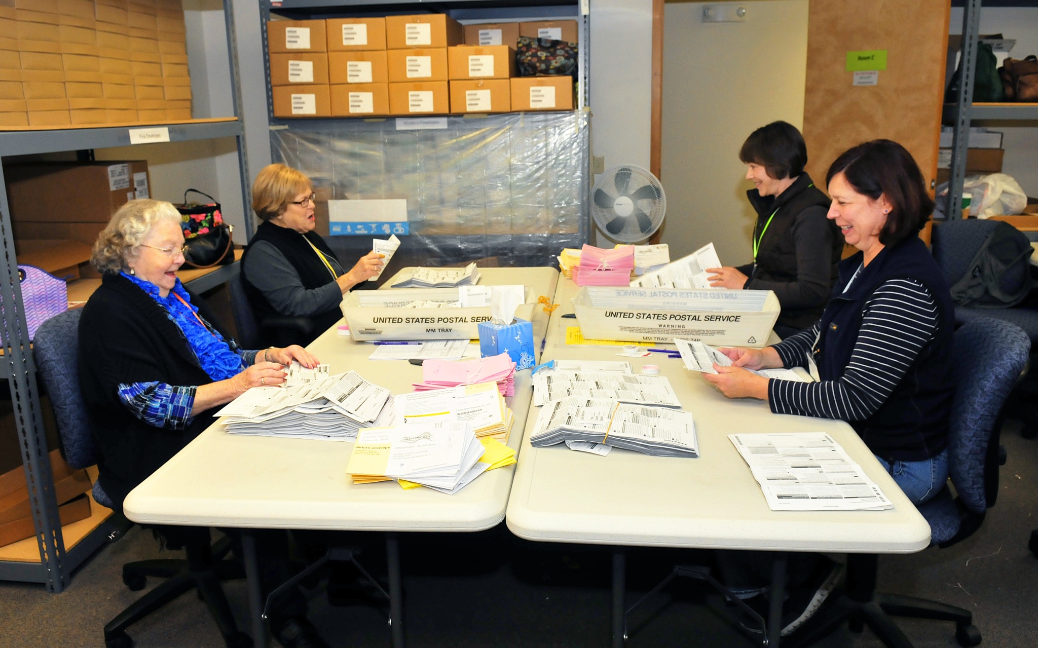 From left to right, Dodie Hanby, Sue Nelson, Casie Horr and Toni Craggs process ballots in Coupeville Monday. Photo by Michael Watkins/Whidbey News-Times