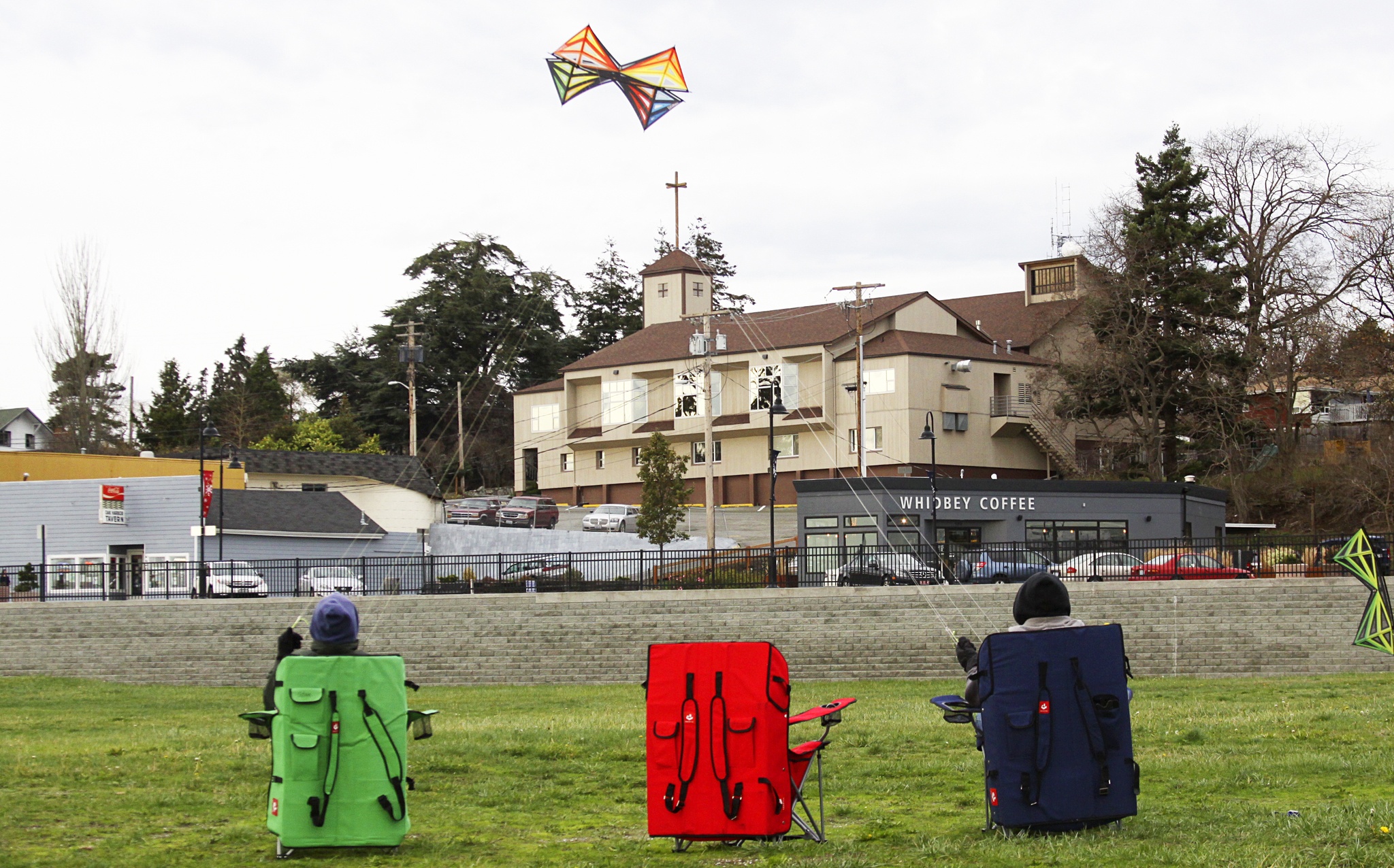 Kite fliers demonstrate tricks on the open field off Bayshore Drive in downtown Oak Harbor Thursday. Photo by Ron Newberry/Whidbey News-Times
