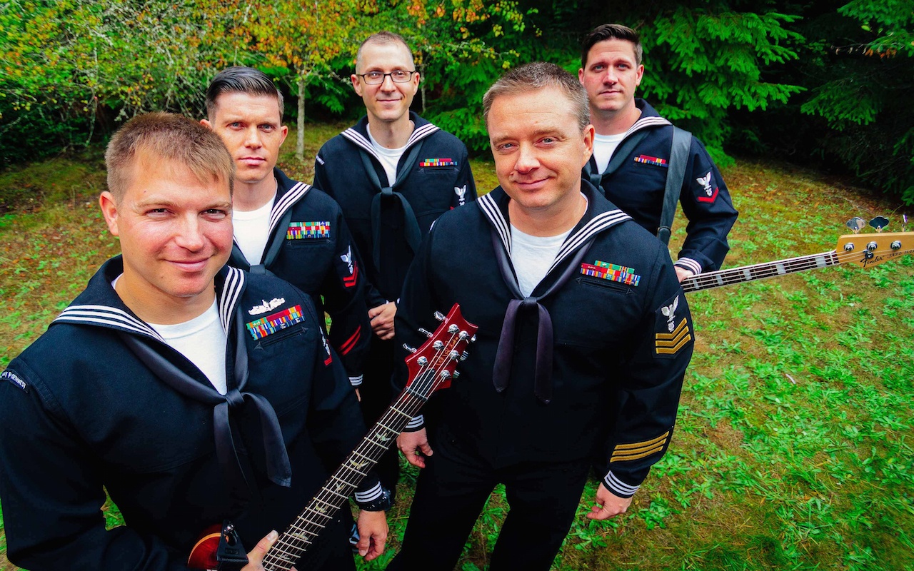 Navy Band Northwest’s popular music band Passage performs popular music and encourages audience interaction. Their repertoire includes hits by Red Hot Chilli Peppers, AC/DC, Bonnie Raitt, Bruno Mars, Journey, Stevie Wonder and Brian Setzer. United States Navy photo