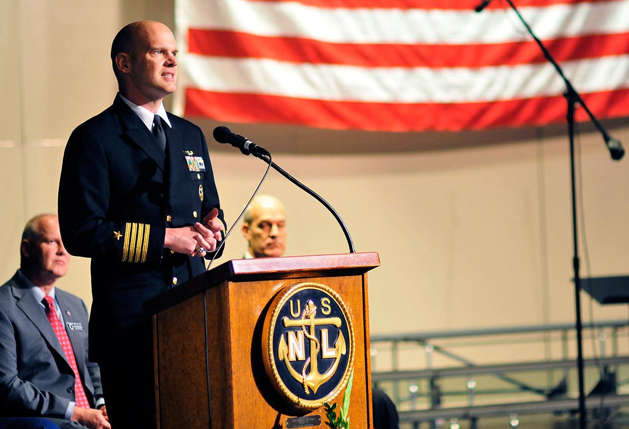 US Navy Capt. Brett Meitus, the keynote speaker for the Oak Harbor Area Council Navy League Veteran’s Day Program speaks to a crowd of veterans at Oak Harbor High School in Oak Harbor, Wash., Nov. 11, 2016. Photo by Michael Watkins/Whidbey News-Times