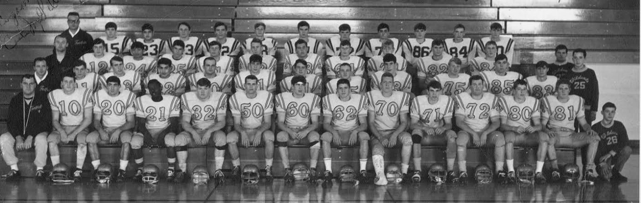 The Oak Harbor High School 1966 football team went undefeated. Head coach Will McGillivary is in the front row, far left. To his left are the starters: Jeff Short, Keith Hoffman, Mel Driver, Mike Tennis, Scott Hornung, Todd Oldenburg, Mel Elvebak, Dave Boon, Mike Nelson, Don Houck, Tim Rowand and Carl Peterson. (Submitted photo)