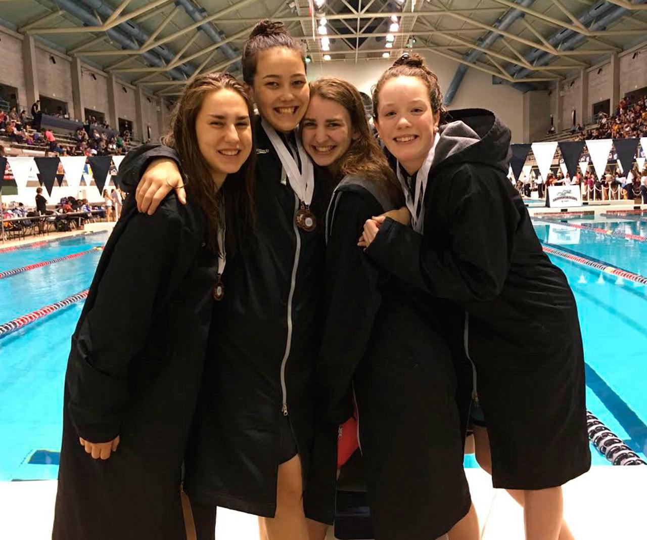 The Oak Harbor High School 200 medley relay team of Taliah Black, left, Olivia Tungate, Molly Vagt and Jillian Pape finished sixth in the state meet Saturday. (Submitted photo)