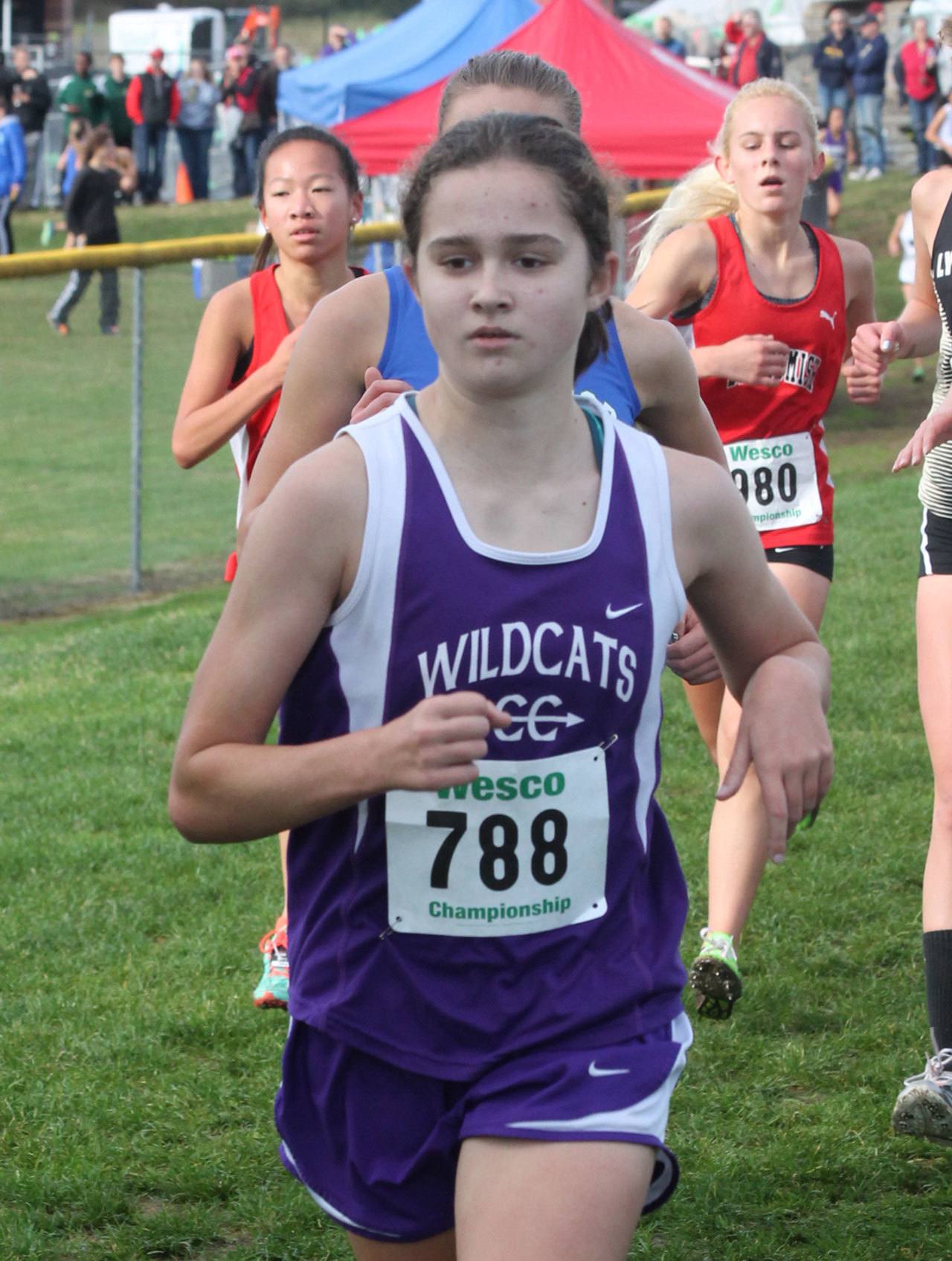 Oak Harbor High School sophomore Alex Smith qualifed for her third Junior Olympics national cross country championship by placing fifth in a regional meet Saturday. (Photo by Jim Waller)