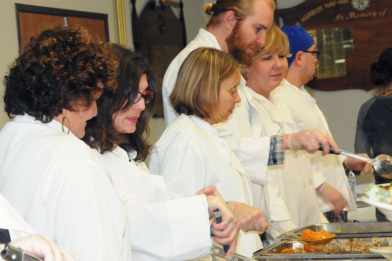 Volunteers have been helping serve the community at the North Whidbey Community Harvest for 15 years. A free Thanksgiving Day meal will be served Thursday at the Oak Harbor Elks Lodge. Photo provided by Skip Pohtilla.