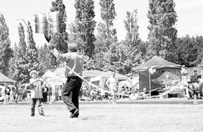 Six-year-old Gunnar and his dad Rich Langvold of Coupeville decided to go fly a kite at Relay for Life. They were at North Whidbey Middle School to cheer on Beverly Langvold