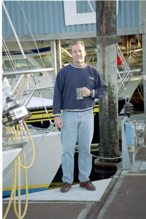 Tim Houck holds the trophy he won for capturing the national title in Megabyte racing last weekend in Seattle.