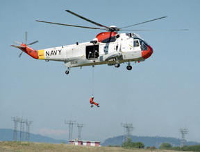 The Search and Rescue team at Whidbey Island Naval Air Station demonstrates their abilities to the crowd Saturday at Thunder on the Rock airshow.