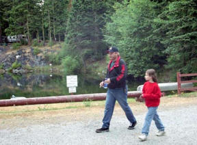 Dave Thistle of Tacoma walks with his niece