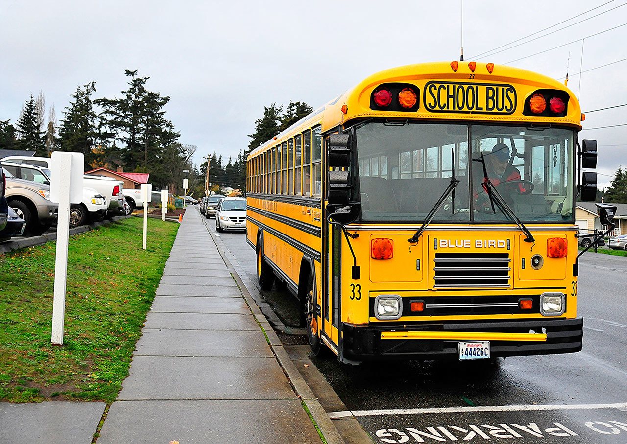 Photo by Michael Watkins/Whidbey News-Times                                Oak Harbor schools are adding video cameras to more than half a dozen buses, like the one pictured above.