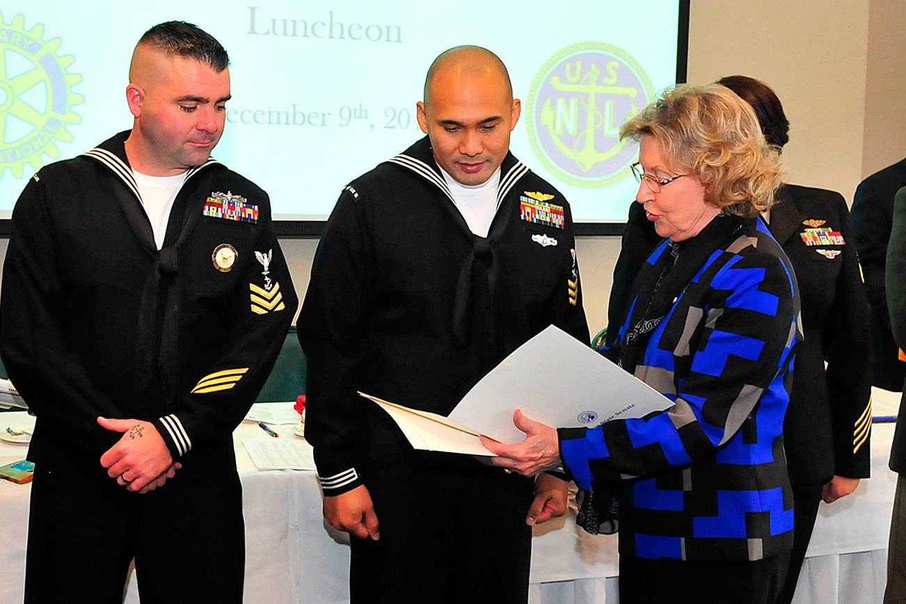 Photo by Michael Watkins/Whidbey News-Times                                Sen. Barbara Bailey presents letters of appreciation to the 2016 Sailors of the Year Friday at Naval Air Station Whidbey Island.