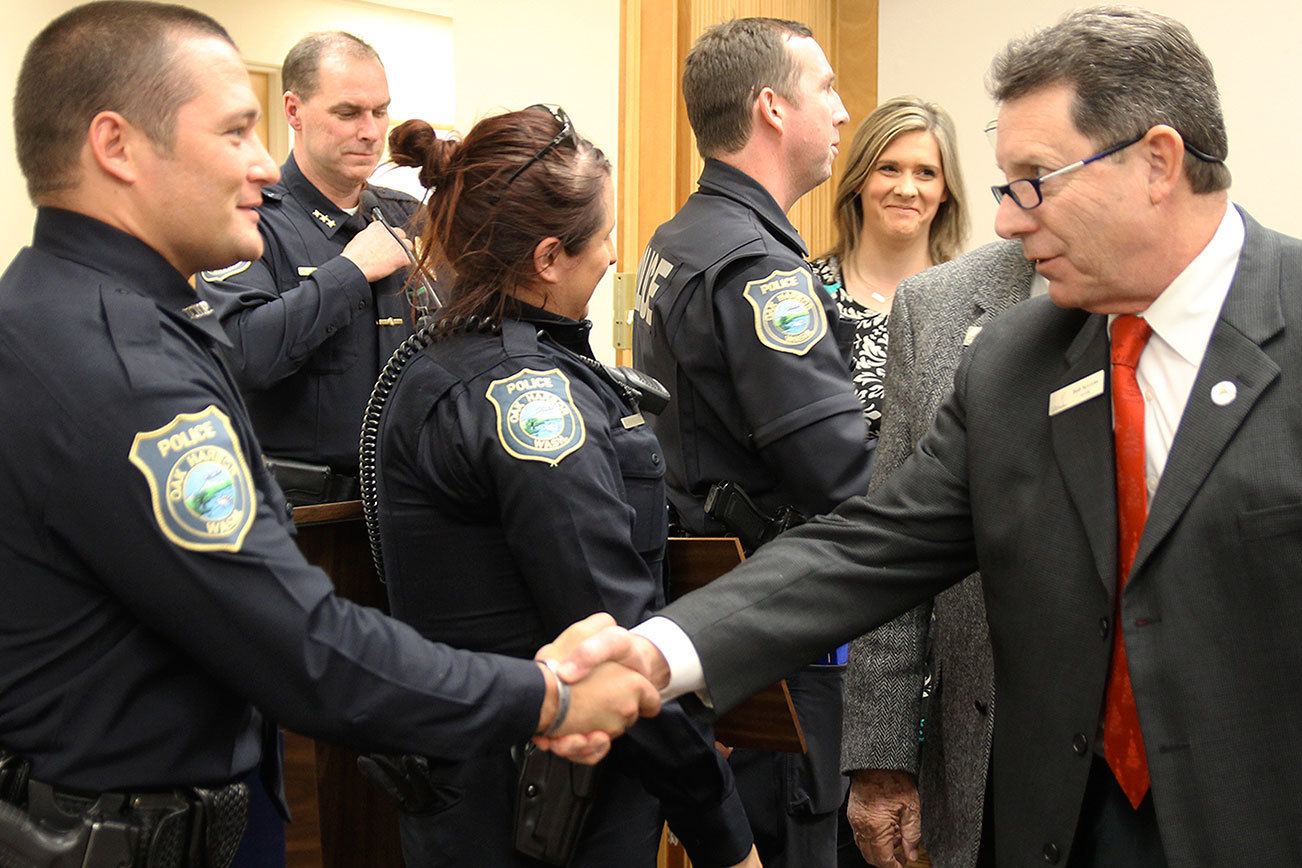 Oak Harbor officers recognize for saving life, catching suspected killer