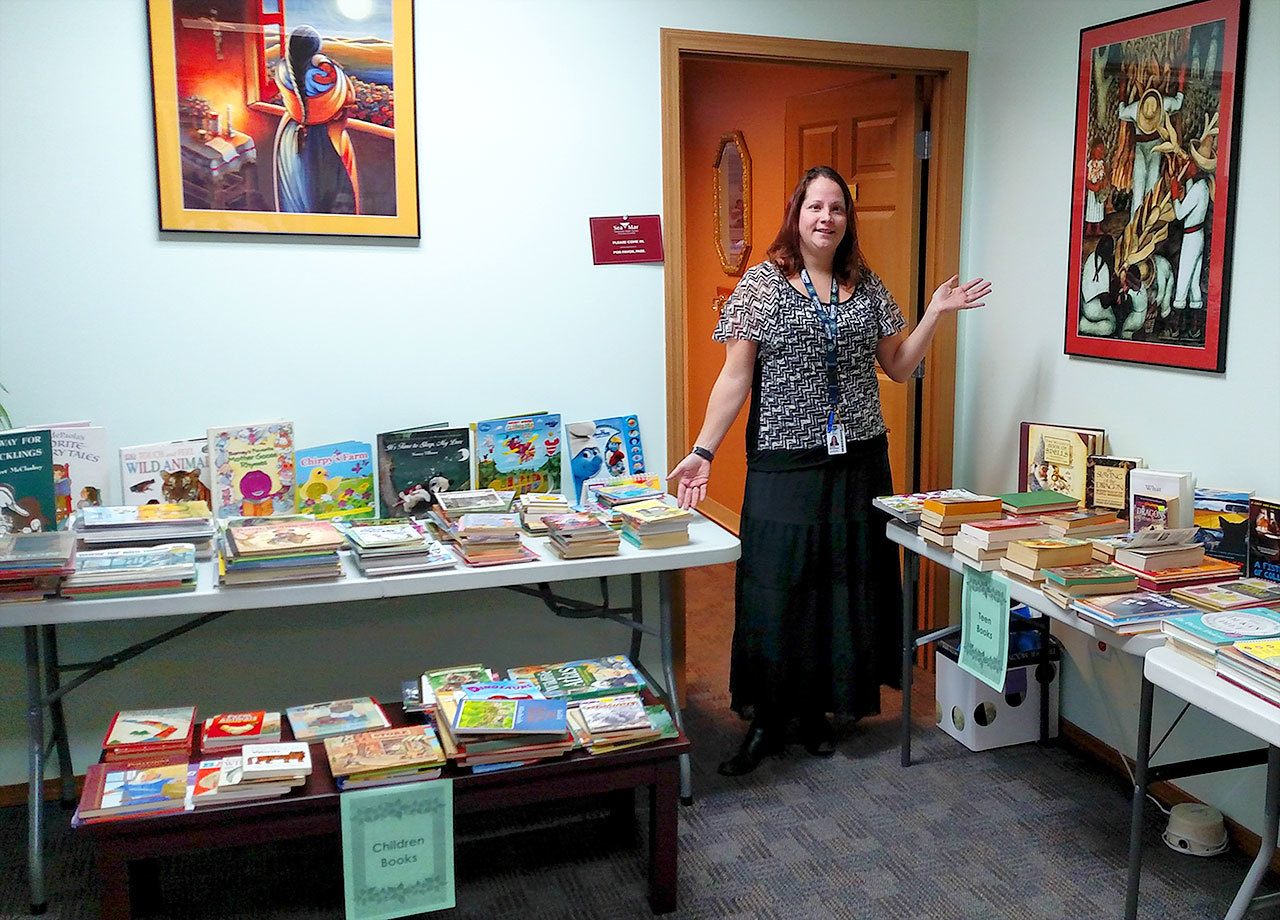 Sea Mar holding book drive for clients