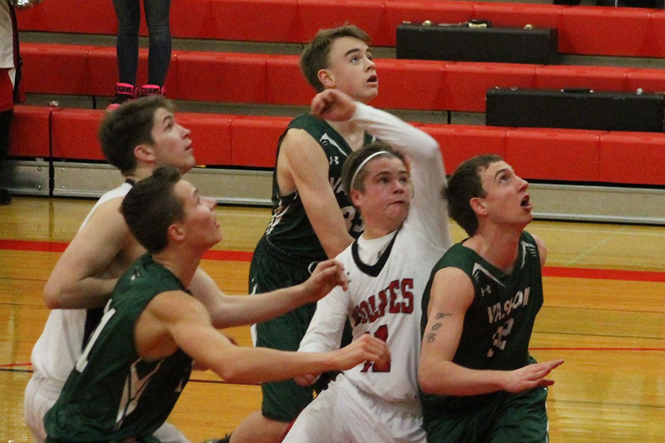 Wolves lose two non-league games / Boys basketball