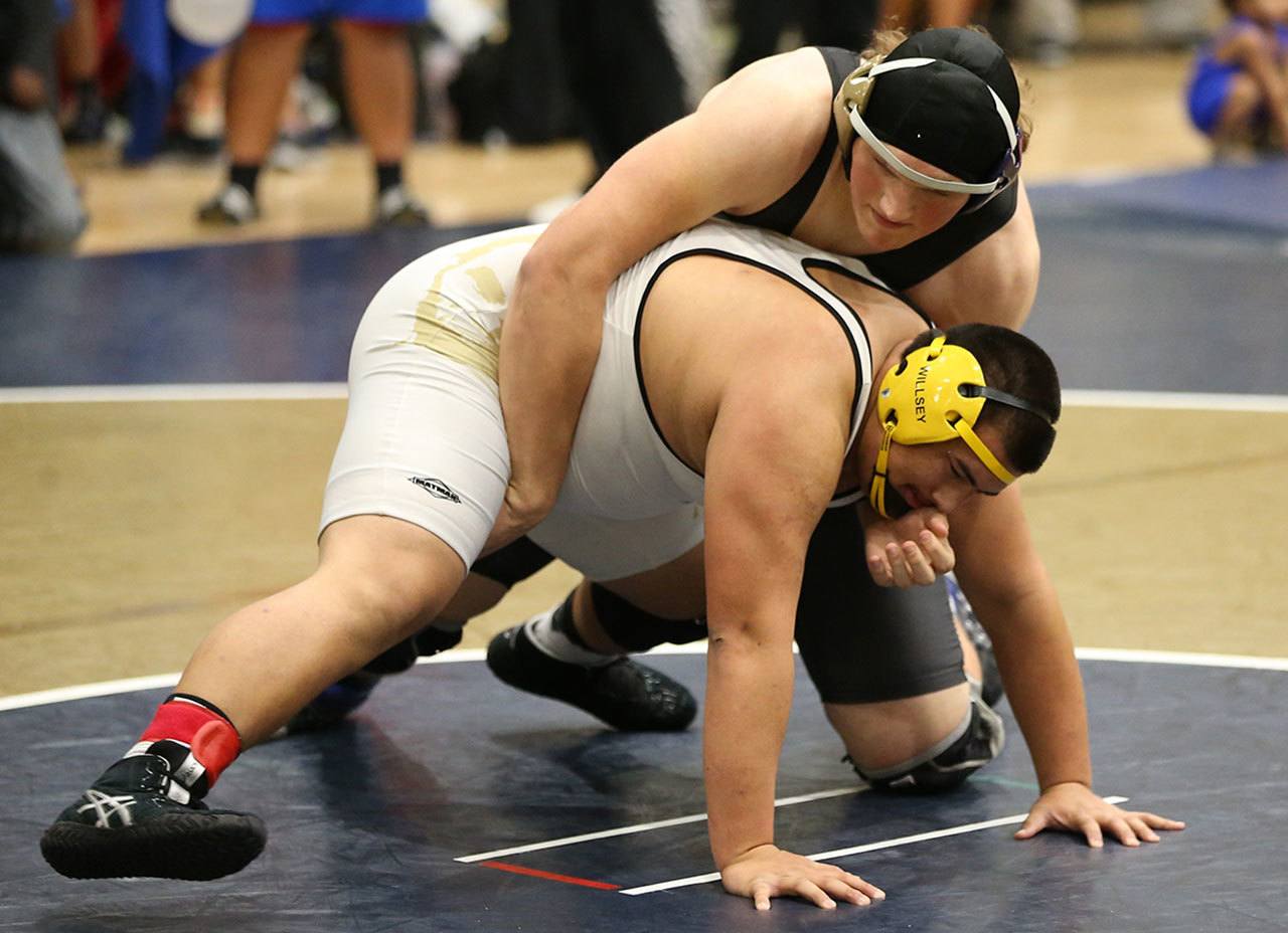 Sam Zook tangles in the championship match Saturday. (Photo by John Fisken)