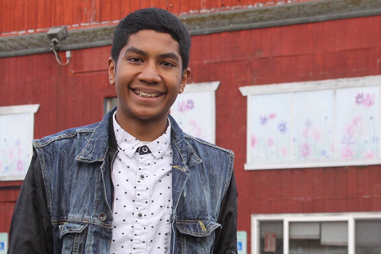 Immanuel McLaurin, a senior at Oak Harbor High School, stands before one of his all-time favorite hangouts, the Boys & Girls Club of Oak Harbor. McLaurin, who volunteers at the club, was selected as the club’s Youth of the Year. Photo by Ron Newberry/Whidbey News-Times