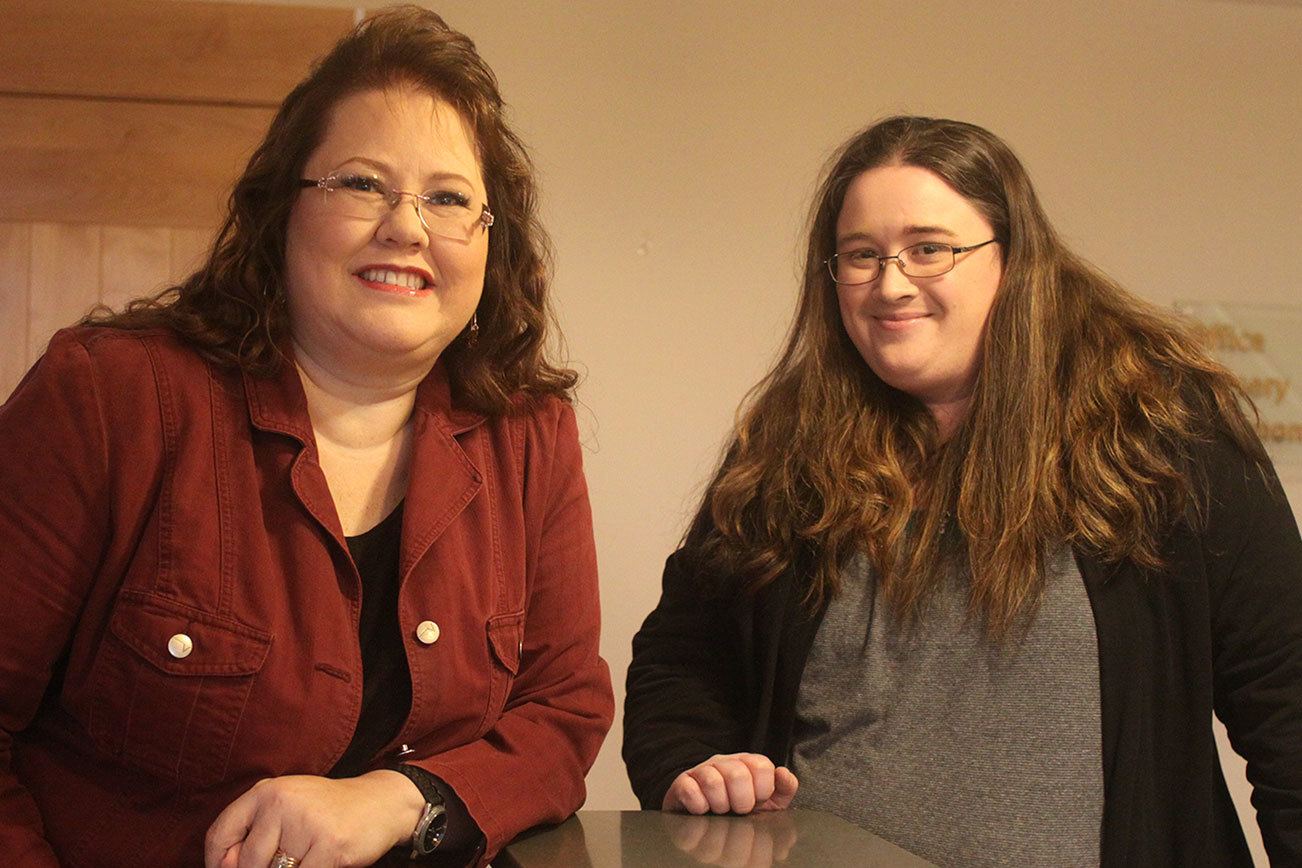 Michelle Oakland, left, worship pastor at Life Church in Oak Harbor, and administrator Laura LeBeau are coordinating “Night to Shine,” a prom night catered to people 14 and older who have special needs. The event in Oak Harbor is Feb. 10. Photo by Ron Newberry/Whidbey News-Times