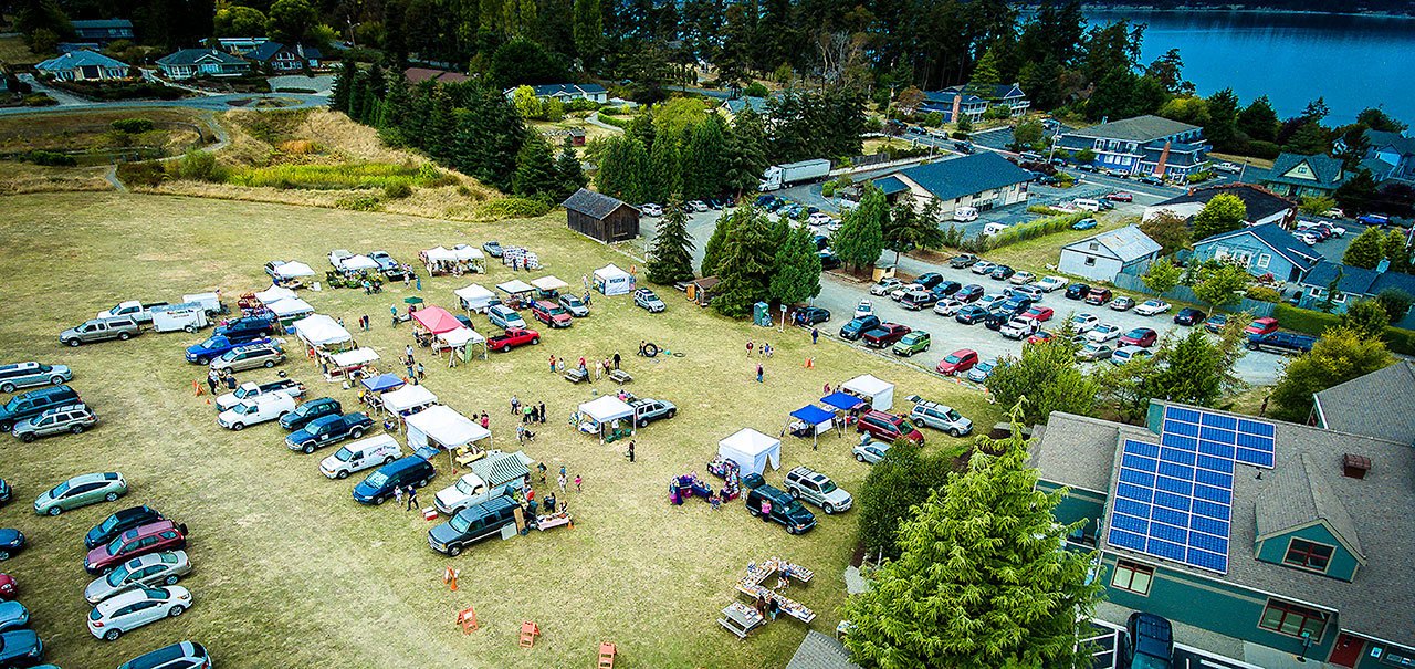 An aerial photo of the Community Green shows one of several open spaces the Town of Coupeville owns and provides its residents for uses like the farmers market. Because of how the town’s level of service is defined in its current comprehensive plan, the town can’t use nearly $70,000 in park impact fees to make improvements to properties like the community green.