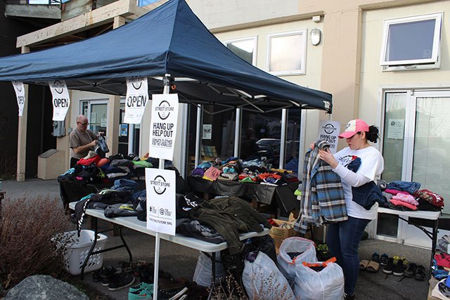 Free clothes and shoes offered at “The Street Store” in front of Oak Harbor’s Spin Cafe were part of Thursday’s homeless Point in Time count. Shawna Pinder said she organized the clothing drive because the need is great.