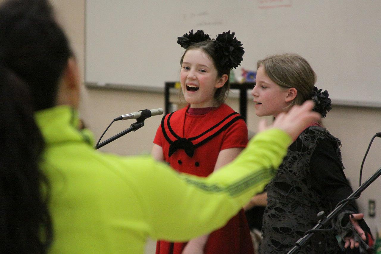 Mary Kate Place and fellow drama club student Hayden Daniel from Coupeville Elementary School rehearse for the musical ‘James and the Giant Peach Jr.” Thursday, Jan. 26, 2017 in the school’s multi-purpose room. Cheridan Eck, foreground, volunteers as the production’s choreographer. Photo by Ron Newberry/Whidbey News-Times