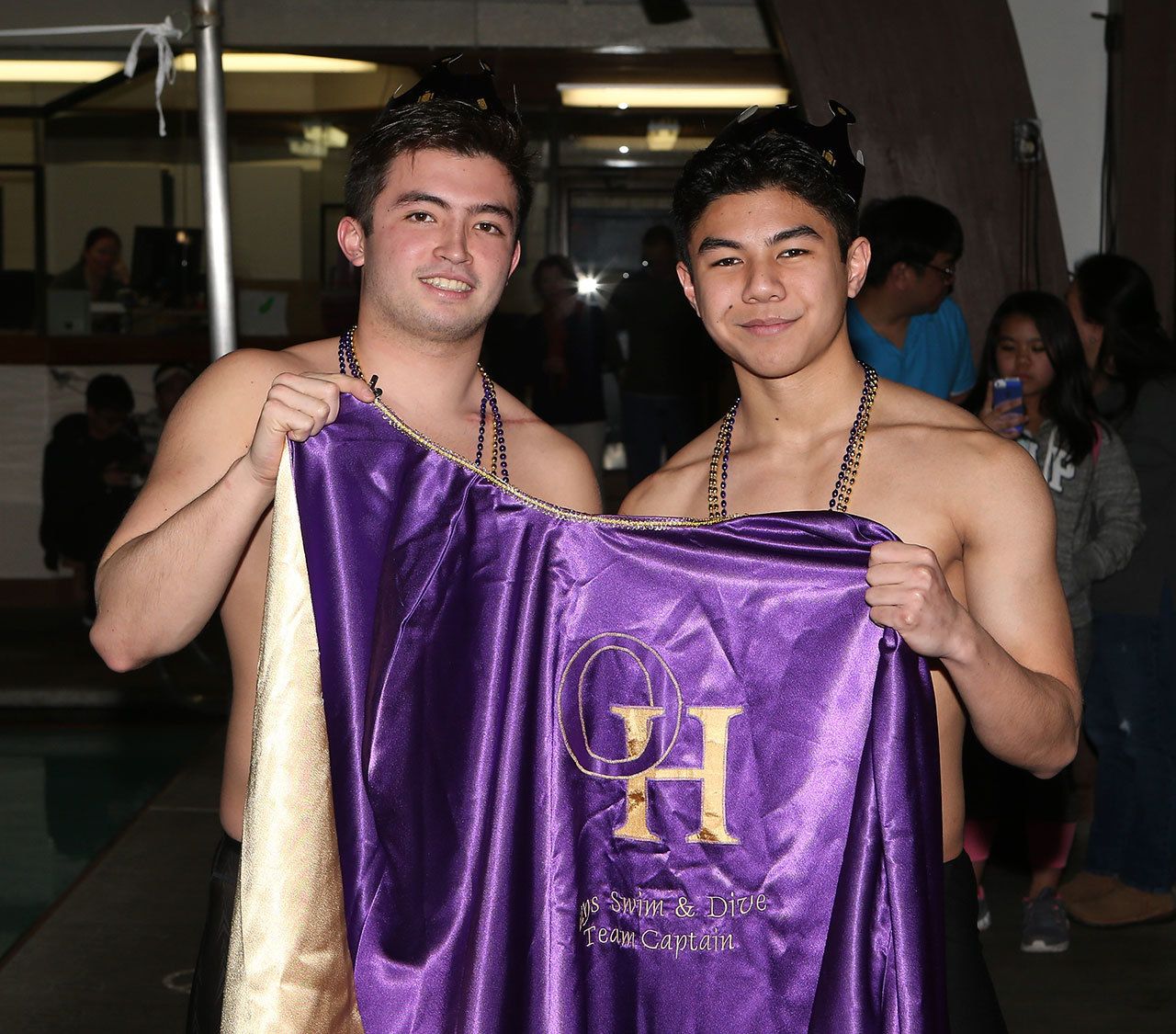 Oak Harbor senior captains Kenneth Morrow, left, and Jose Cabigting get ready for their final home meet. (Photo by John Fisken)