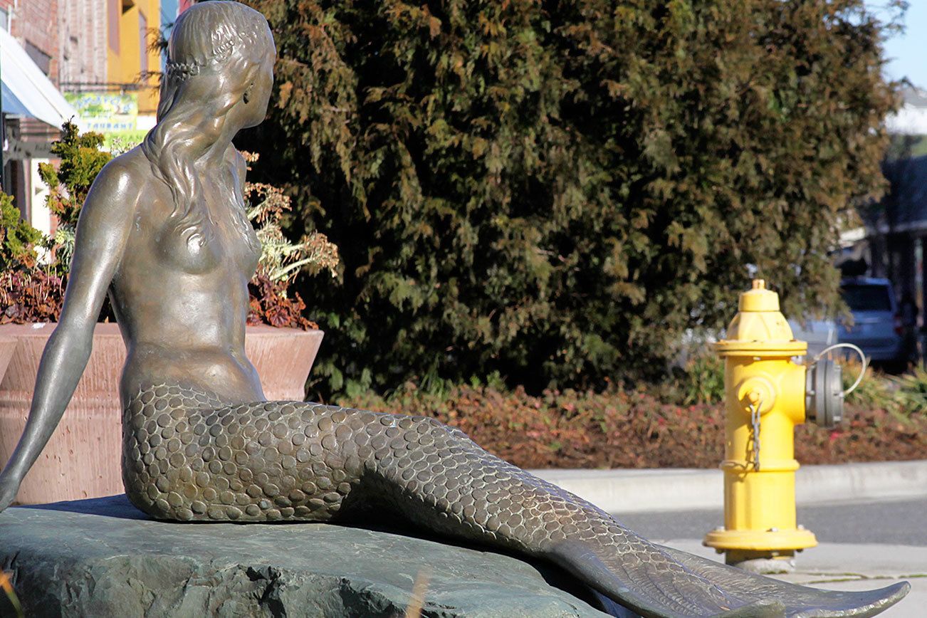 The mermaid sculpture in downtown Oak Harbor should be enjoying a better view soon once a proposal to allow artists to paint fire hydrants along Pioneer Way gets off the ground. Photo by Ron Newberry/Whidbey News-Times