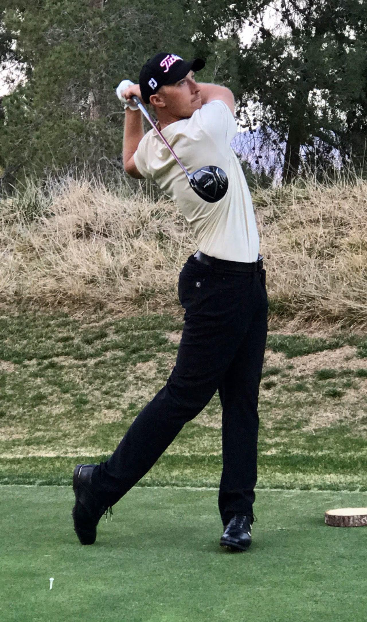 Eric McCardle tees off at the Shadow Creek Golf Course in Las Vegas earlier this month. (Photo by Jennifer Hahn)