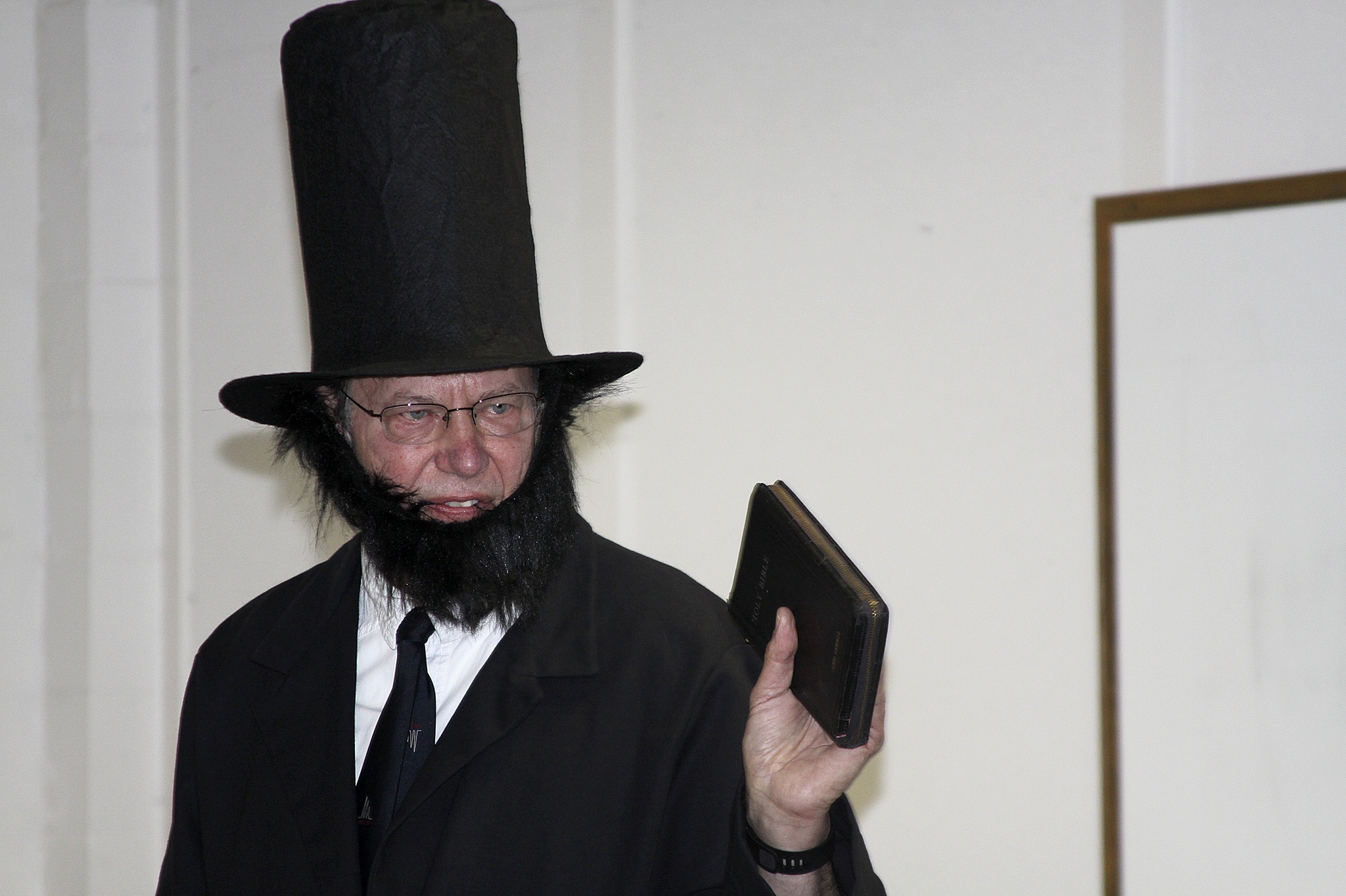Alan Schell of Oak Harbor dresses up as Abraham Lincoln and impersonates the former U.S. president in the spirit of President’s Day Wednesday, Feb. 15, 2017 at Oak Harbor Christian School. Children from kindergarten through sixth grade attended. Photo by Ron Newberry/Whidbey News-Times