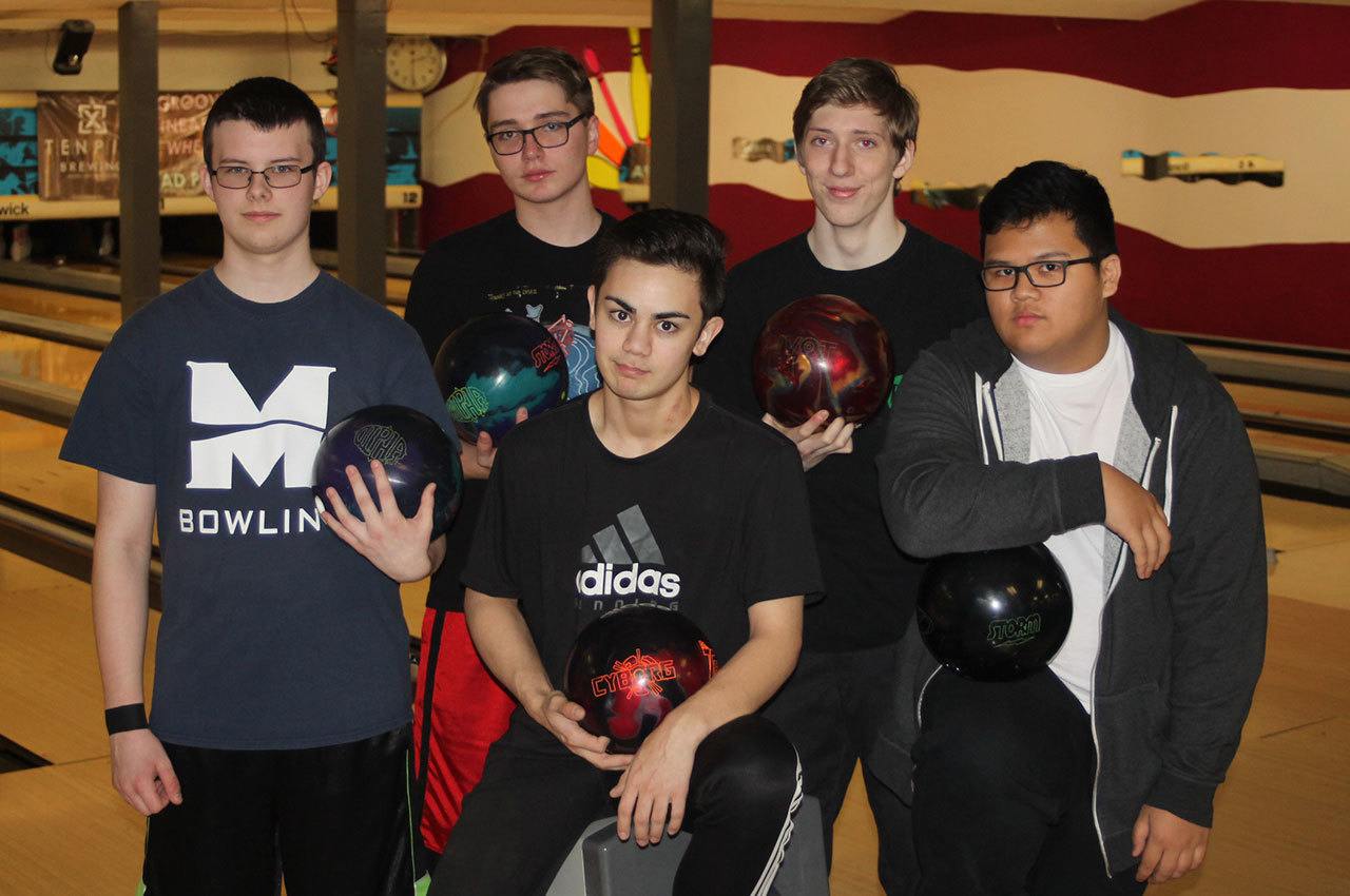 The Oak Harbor High School bowling team heads to Spokane this weekend in hopes of winning their fifth state title in seven years. From left are Daniel Johnson, Niko Hawkins, DJ Rutter, Devin McCardle and Earl Angeles. (Photo by Jim Waller/Whidbey News-Times)
