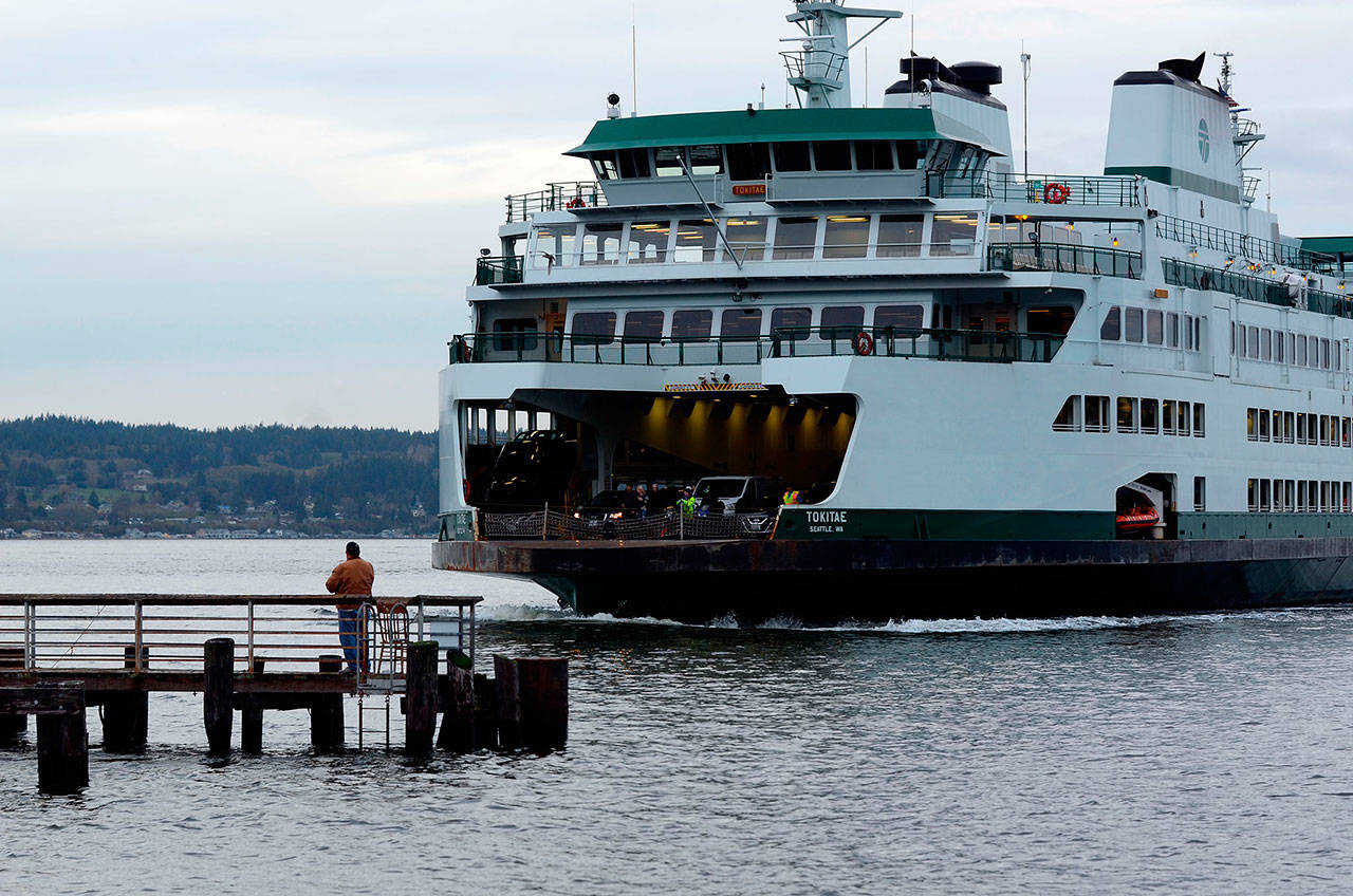 Record file — The Washington State Ferry Tokitae pulls into Mukilteo. The state transportation agency is proposing schedule changes this summer that it hopes will address long delays associated with mismatched boats that operate on the run.