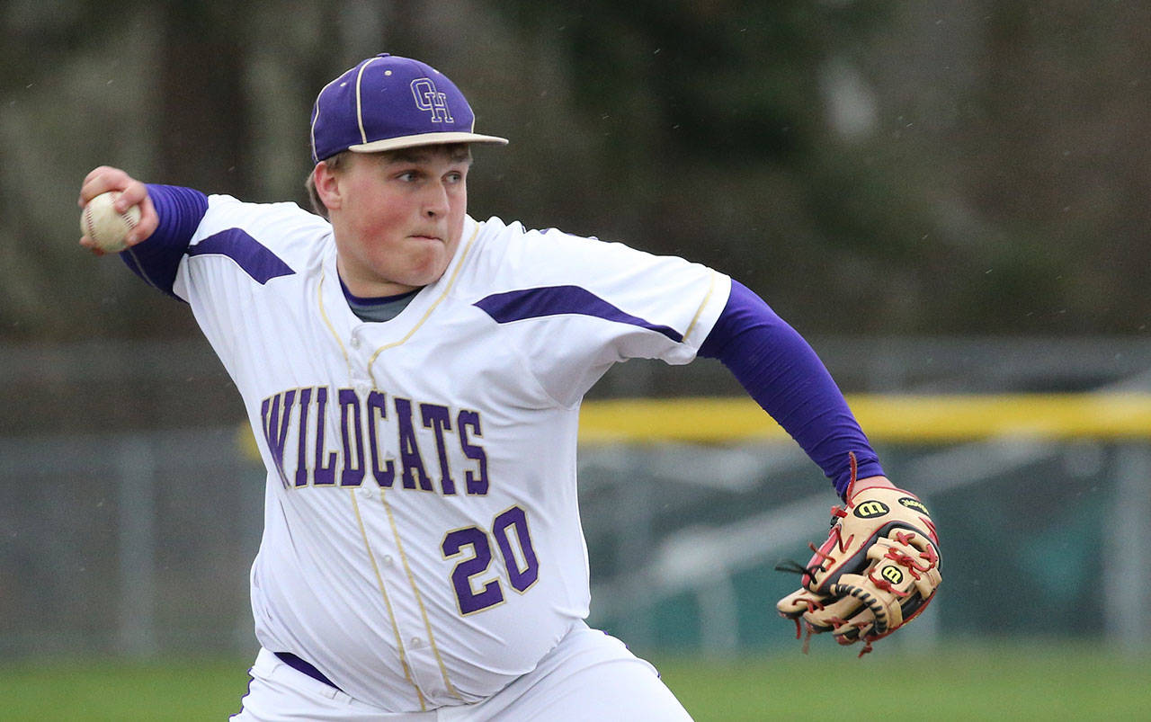 Noah Miller gets ready to throw across the diamond. (Photo by John Fisken)