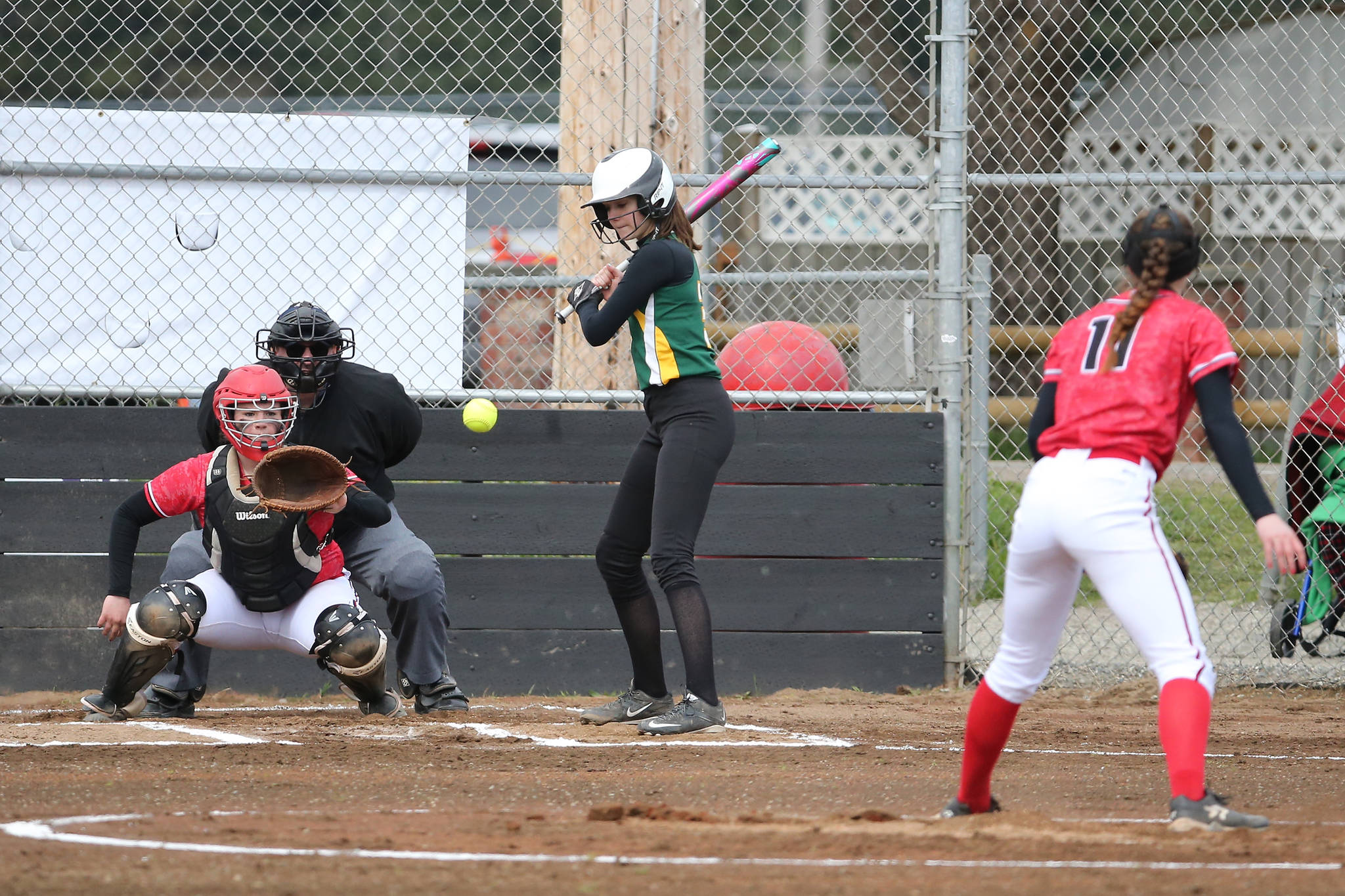 Coupeville pitcher Katrina McGranahan fires to catcher Sarah Wright. (Photo by John Fisken)